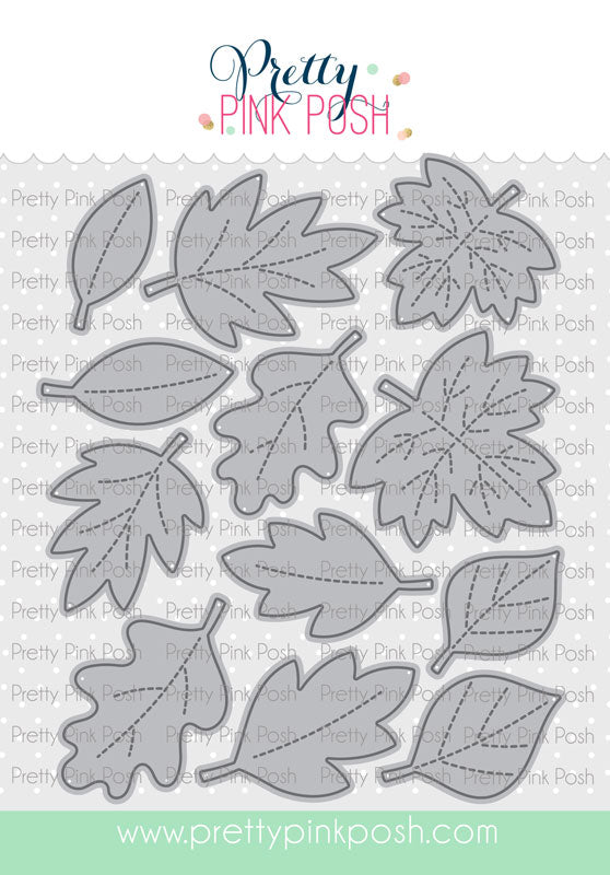 A sheet of die-cut leaf shapes from Pretty Pink Posh, featuring various autumn leaf designs in gray with dashed line details, shown on a white patterned background with the brand logo at the top. Pretty Pink Posh Stitched Leaves Dies