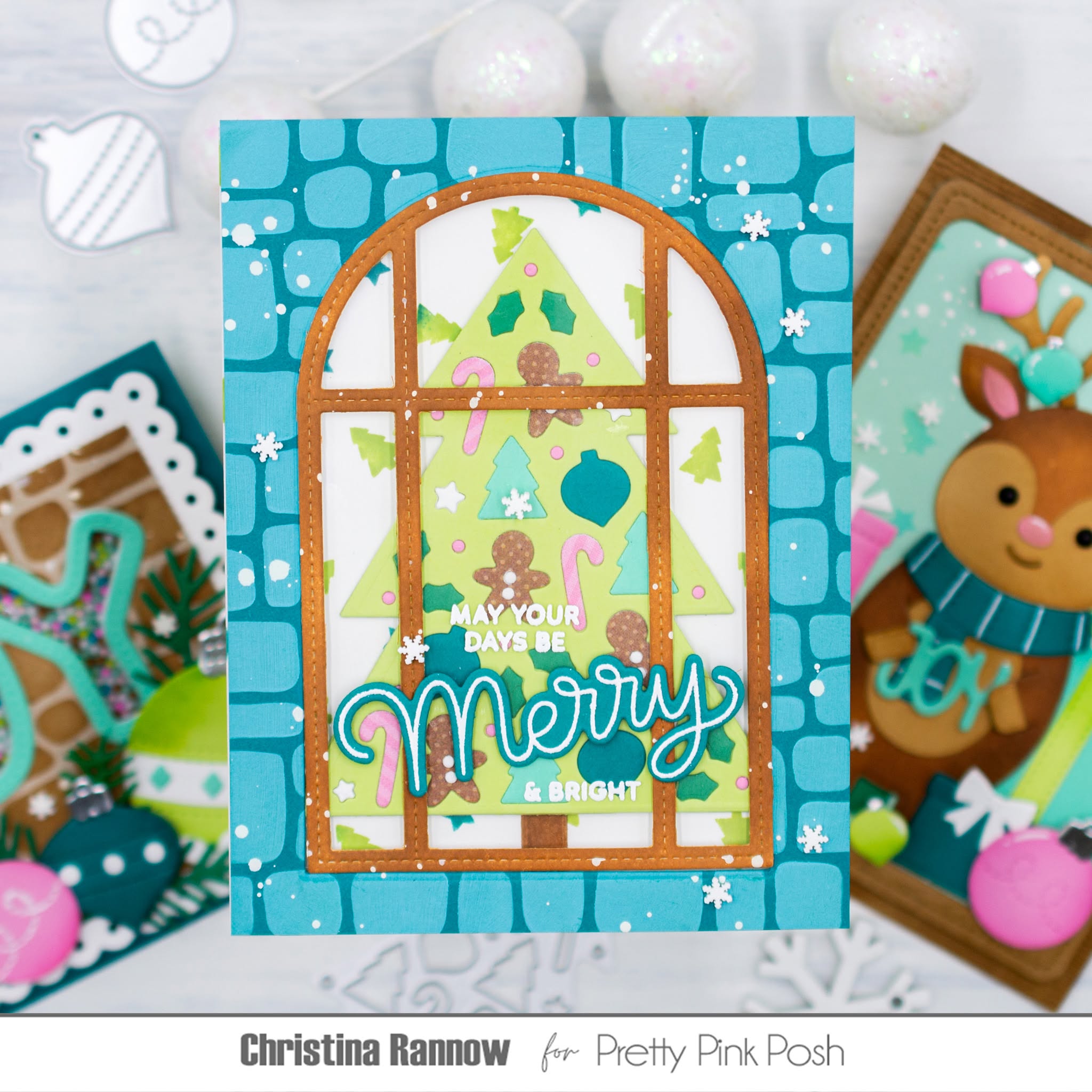 A handmade Christmas greeting card featuring an arched window design with gingerbread trees, candy canes, and the text 'Merry & Bright'. The card is styled on a white surface with other cards and decorative elements in the background.