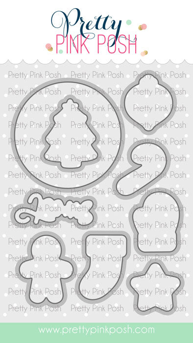 A sheet of craft dies from Pretty Pink Posh, featuring multiple Christmas-themed shapes like a Christmas tree, Santa, a stocking, and a snowman, shown on a branded white background with a green footer. Pretty Pink Posh Sweet Christmas Cookies Coordinating Dies