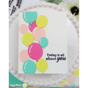 A handmade greeting card featuring colorful paper balloon illustrations and the stamped text 'Today is all about you', displayed on a white beaded plate.