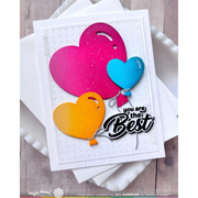 A handmade greeting card featuring three glittery heart-shaped balloons in pink, blue, and orange, with the text 'you are the Best' in black script, displayed on stacked white cards over a light wood background.