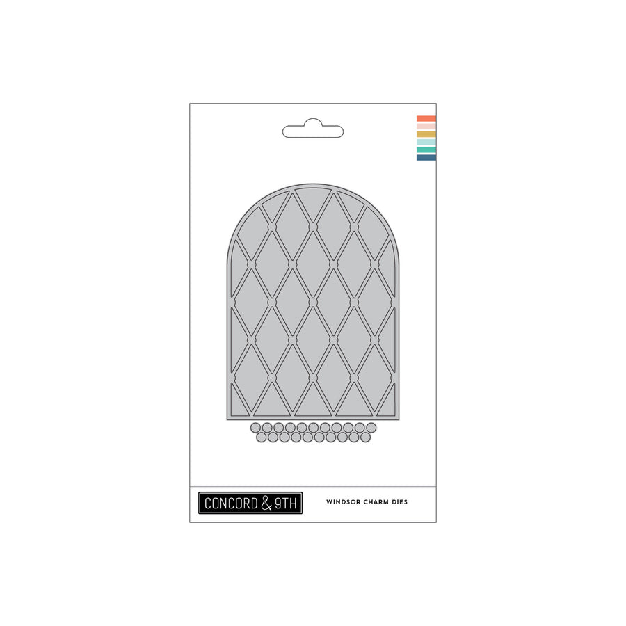 Windsor Charm Dies from Concord & 9th' in its retail packaging, featuring a gray arched window frame design with a diamond lattice pattern and a row of small oval links below.