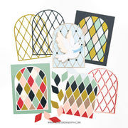 Six colorful card designs featuring arch-shaped window frames with diamond patterns in various colors, arranged on a white background. A white dove card is layered over one of the window designs.