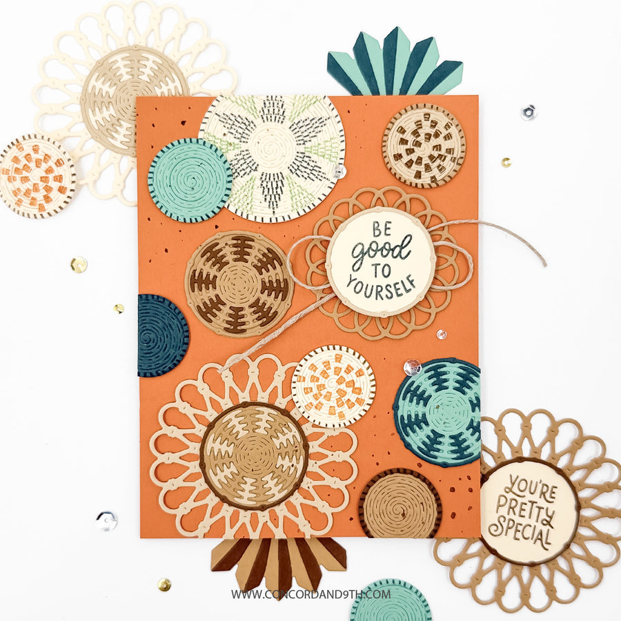 A handmade greeting card with a terracotta orange background, decorated with layered circular floral and geometric designs in beige, cream, teal, and brown. Two round wooden nameplates are attached to the card, one reading 'BE GOOD TO YOURSELF' and the other partially visible at the bottom right reading 'YOU'RE PRETTY SPECIAL'.